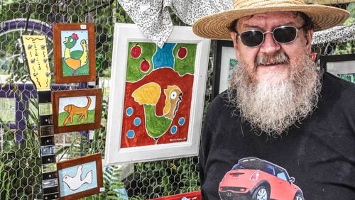 Charlie Dingler of Clayton, known for his boldly painted yard art, credits the Viral Art Facebook page with supporting him throughout a summer of canceled folk art festivals due to COVID-19. 
Courtesy of Robert White