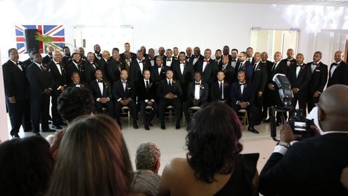 The newly inducted class of 100 Black Men of Atlanta poses for a group portrait at organization’s 2018 Gala early this month at Bentley Atlanta in Alpharetta. (Casey Sykes for The Atlanta Journal-Constitution)