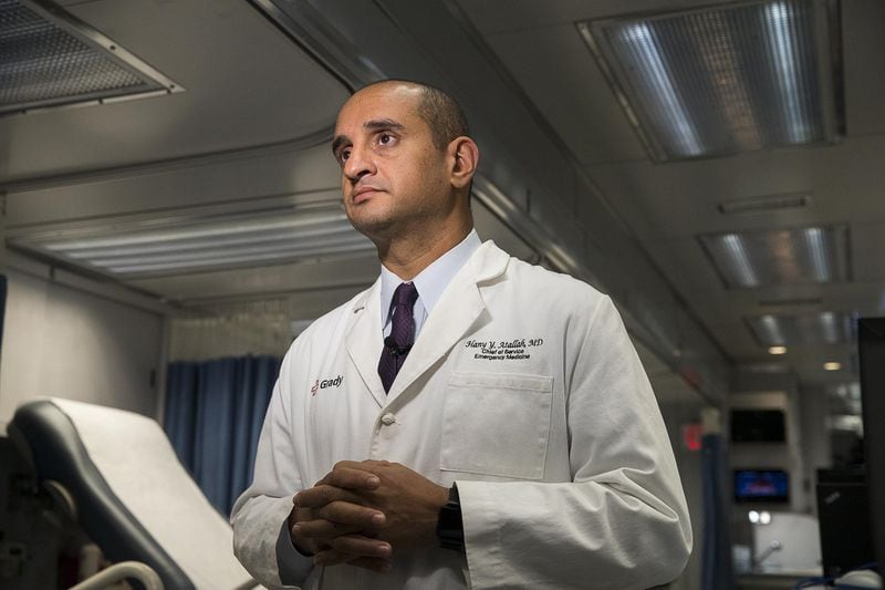 Grady Memorial hospital chief of emergency medicine Dr. Hany Atallah answers questions inside the Carolinas MED-1, a mobile medical facility. (ALYSSA POINTER/ALYSSA.POINTER@AJC.COM)