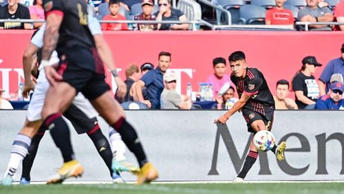 Atlanta United midfielder Thiago Almada #8 kicks the ball during the second half of the match against Chicago Fire FC at Soldier Field in Chicago, United States on Saturday July 30, 2022. (Photo by Dakota Williams/Atlanta United)