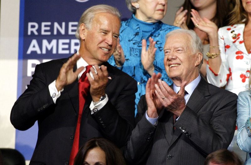Former President Jimmy Carter (right) is seen with then-Democratic vice presidential candidate Sen. Joe Biden, D-Delaware, at the Democratic National Convention in Denver, Tuesday, Aug. 26, 2008. Biden, now president, spoke recently about Carter, who is in hospice care. (Paul Sancya/AP)