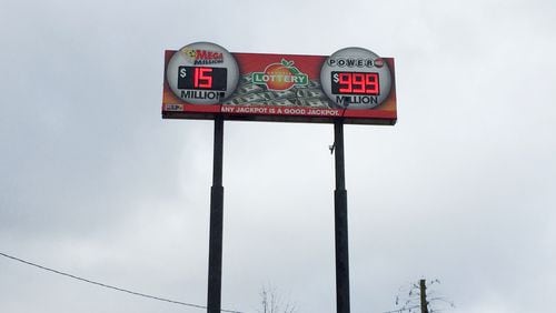 As of Jan. 10, 2016, the Powerball jackpot was expected to reach $1.3 billion. What to do with signs like these? (Credit: Channel 2 Action News)