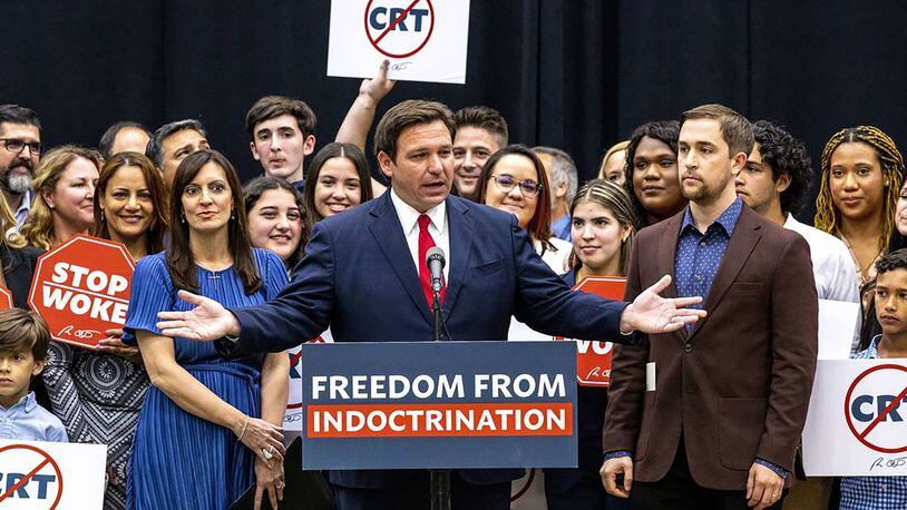 Florida Gov. Ron DeSantis signed House Bill 7, known as the Stop Woke bill, in Hialeah Gardens, Fla., on April 22, 2022. He is now targeting woke campuses. (Daniel A. Varela/Miami Herald/TNS)