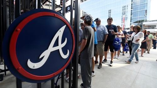 Fans wait in line to enter Atlanta Braves' SunTrust Park.