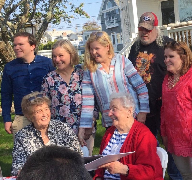 Gloria Jameson, seated and right, joined by family and friends at her 90th birthday party last summer in her hometown, Gloucester, Massachusetts. Standing behind her is her grandson Bobby, daughters Cathy, Elaine and Cindy and son Steve. Sitting next to Jameson is her best friend of 85 years, June Urban.