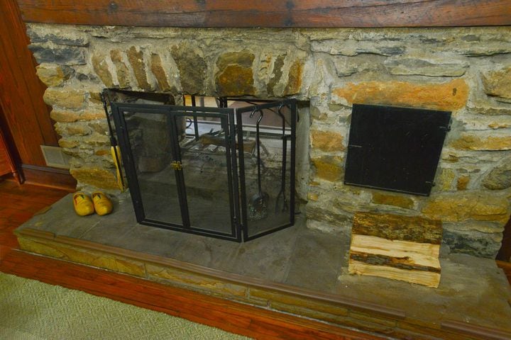 Double-sided stone fireplace