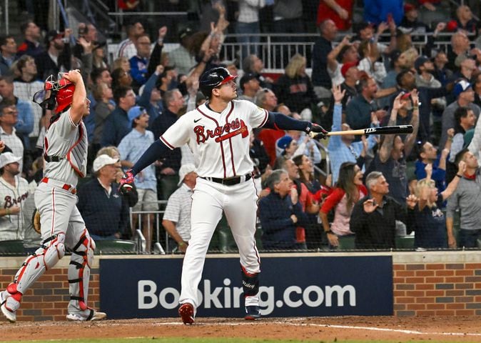 Atlanta Braves’ Austin Riley (27) hits a two-run home run against the Philadelphia Phillies during the eighth inning of NLDS Game 2 in Atlanta on Monday, Oct. 9, 2023.   (Hyosub Shin / Hyosub.Shin@ajc.com)