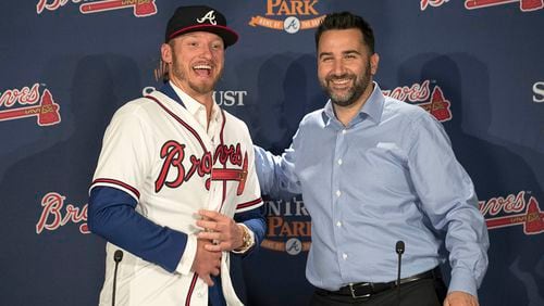 Braves GM Alex Anthopoulos (right) introduces Josh Donaldson during a November press conference at SunTrust Park. (Alyssa Pointer/AJC)
