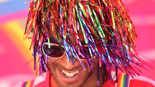 Christian Goodlette sports some pride hair during the Pure Heat Community Festival, part of Black Gay Pride weekend, at Piedmont Park in 2016. Curtis Compton /ccompton@ajc.com