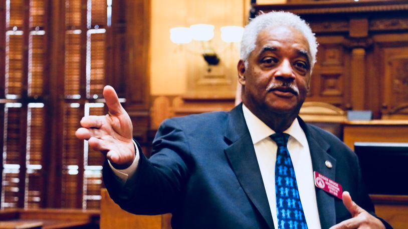 State Rep. Roger Bruce, D-Atlanta, agreed to pay a $250 fine to settle a case involving his distribution of water to voters while wearing a shirt with his name on it during the 2020 election. But Bruce said he didn’t break the law.