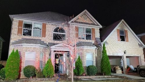 A man was charged with felony arson and domestic violence after he set fire to a Gwinnett County home while his wife, children and mother-in-law were still inside, authorities said.