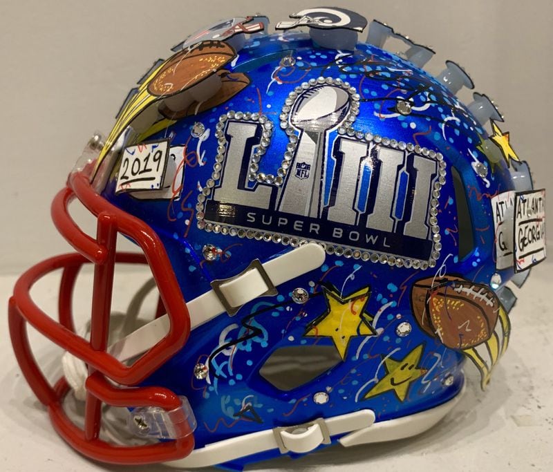 Charles Fazzino has been the official Super Bowl artist for 19 years. His other artwork includes NFL helmets featuring his signature 3D style. CONTRIBUTED
