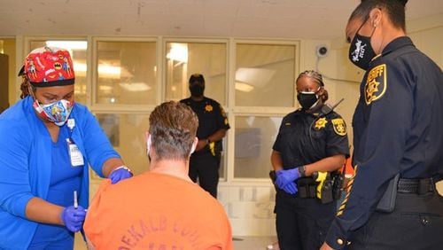 The DeKalb County Sheriff's Office vaccinated dozens of inmates.
