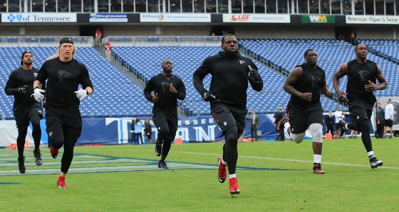 102515 NASHVILLE: -- Falcons players loosen up at Nissan Stadium as they prepare to play the Titans in a football game on Sunday, Oct. 25, 2015, in Nashville. Curtis Compton / ccompton@ajc.com