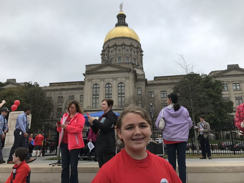 James Stevens, a 15-year-old student at Centennial High School in Roswell, joined his mother at a gun control demonstration Wednesday at the Georgia State Capitol. He and other students are becoming more active in the gun-control debate in the wake of the school shooting in Parkland, Fla. Vanessa McCray/AJC