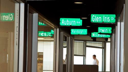 A hallway at Salesforce's Atlanta office is lined with local street signs as part of the fun atmosphere. It was voted the No 1 topworkplace for large companies. (Photo by Phil Skinner)