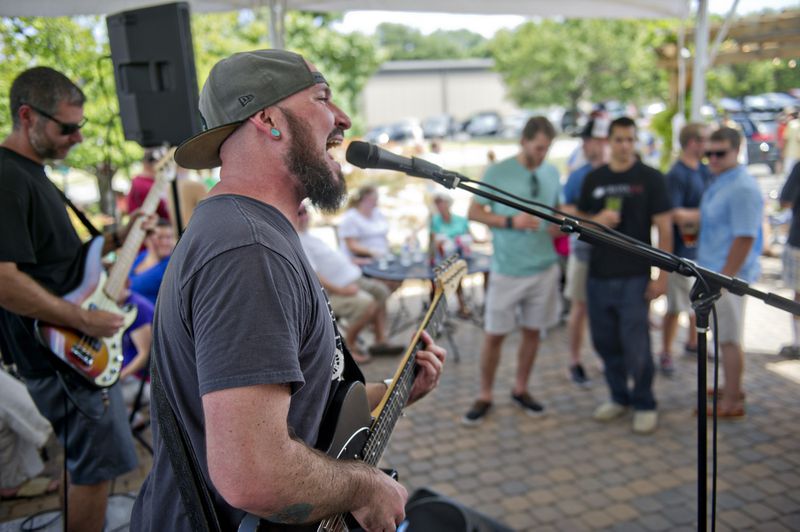 Anthony Crane (right) and Doug Gross with the band Wrong Way perform at Red Hare Brewery in Marietta during the company's third anniversary party on Saturday, August 23, 2014. JONATHAN PHILLIPS / SPECIAL