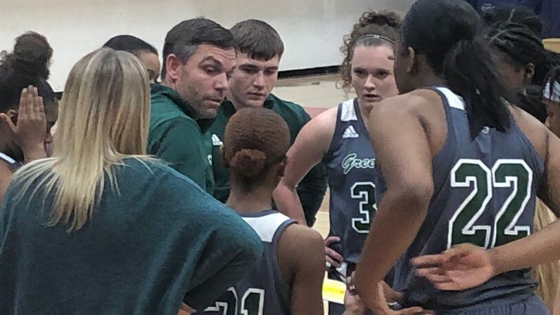 Greenbrier basketball coach Ryan Morningstar gives his girls direction during a timeout in a game at Loganville on Jan. 25, 2022.