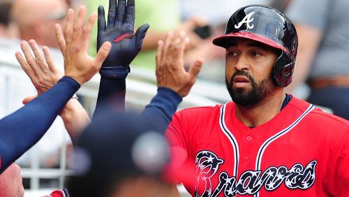 Matt Kemp of the Braves is congratulated by teammates after hitting a fourth-inning solo home run against the Washington Nationals at SunTrust Park on May 20, 2017 in Atlanta. (Photo by Scott Cunningham/Getty Images)