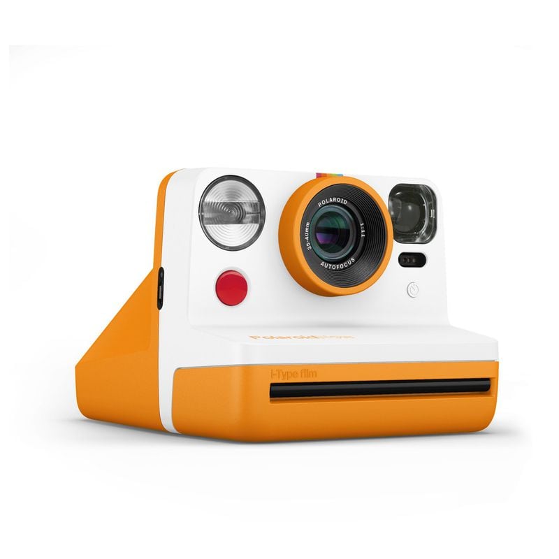 Make the day merry by capturing joyful family moments with a Polaroid Now i-Type instant camera. Contributed by Polaroid