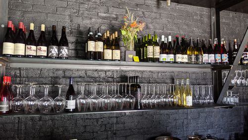 The back bar at 8Arm Wine is stocked with natural wines from small producers across various wine regions.