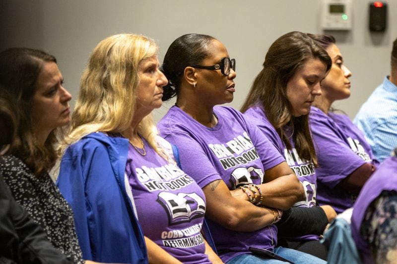 People show up in support of Cobb County teacher Katie Rinderle at a hearing at the Cobb County Board of Education in Marietta on Thursday, August 10, 2023. Rinderle is facing termination after reading “My Shadow is Purple,” a book about gender identity, to fifth graders. (Arvin Temkar / arvin.temkar@ajc.com)