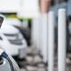 CBRE is partnering with EV+ to install 10,000 electric vehicle charging stations at public places across the country.