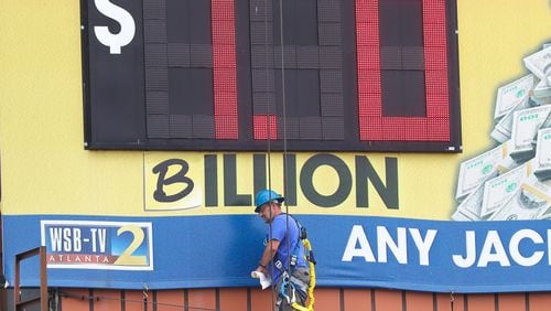 The Mega Millions billboard on Central Avenue in southwest Atlanta was modified Friday after the jackpot reached a record $1 billion. The ‘M’ in ‘Million’ was replaced with a ‘B.’