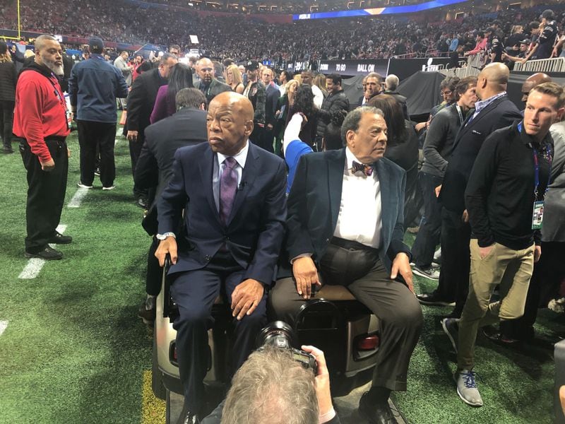 Civil rights leaders John Lewis and Andrew Young on the field before the start of Super Bowl LII at Mercedes-Benz Stadium in Atlanta on Sunday, Feb. 3, 2019.