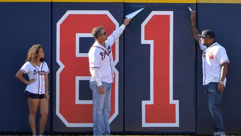 April 4, 2016 Atlanta - 1997 Braves team members Chipper Jones and Andruw Jones kick off the home game countdown by removing â€œ81â€ in the middle of the fifth inning during the home opener at Turner Field on Monday, April 4, 2016. HYOSUB SHIN / HSHIN@AJC.COM