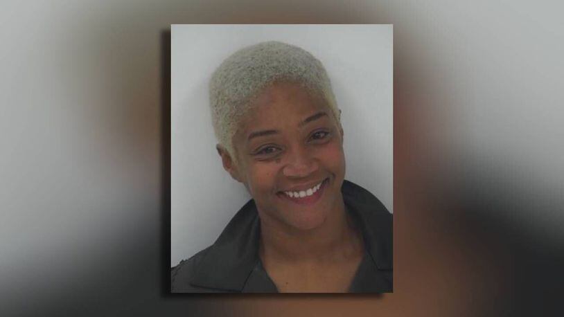 Actress Tiffany Haddish smiles in a mugshot following metro Atlanta DUI arrest. (Credit: Channel 2 Action News)