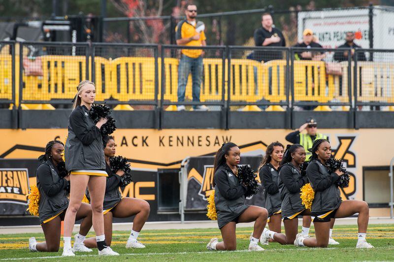 Kennesaw State University was the scene of a high-stakes racial drama last fall when several cheerleaders took a knee during the National Anthem and KSU’s then-president, Sam Olens, was bounced from his job because of how he handled the controversy. (Photo: Cory Hancock / Special to the AJC)