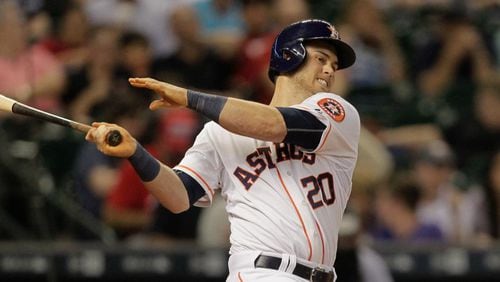 Houston Astros'  Preston Tucker (20) doubles down the right field line against the Toronto Blue Jays in the fifth inning of a baseball game Thursday, May 14, 2015, in Houston. (AP Photo/Bob Levey)