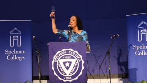 Spelman College President Dr. Helene D. Gayle salutes her Class of 2024 graduating seniors at a party at the Georgia Aquarium.