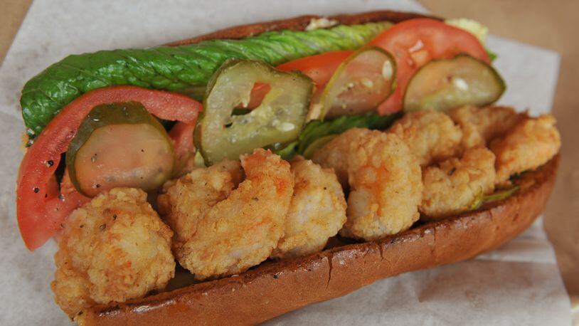 Shrimp po' boy with lettuce, tomato, pickle, cajun mayonnaise and hoagie roll at Star Provisions. (BECKY STEIN)