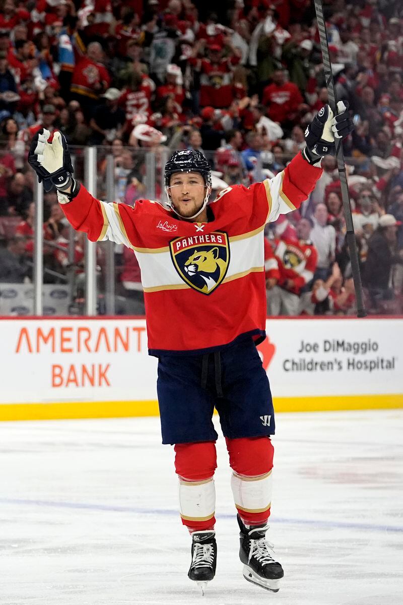 Florida Panthers defenseman Brandon Montour celebrates after Steven Lorentz scored a goal against the Boston Bruins during the second period of Game 2 of a second-round series of the NHL hockey Stanley Cup playoffs Wednesday, May 8, 2024, in Sunrise, Fla. (AP Photo/Lynne Sladky)