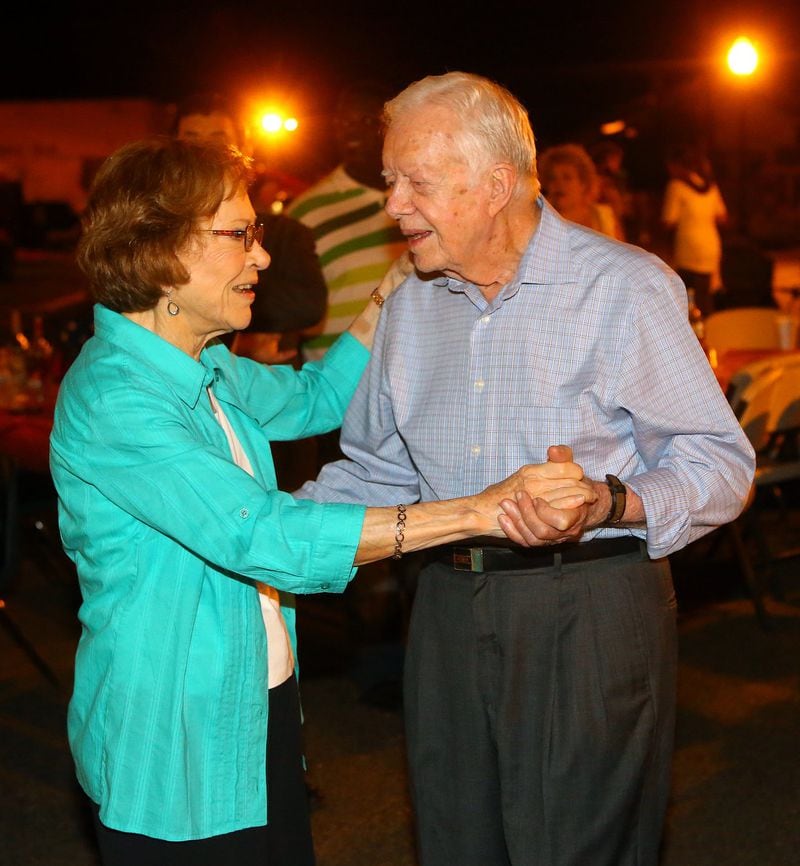 President Jimmy Carter and wife Rosalynn dance during the 18th annual Plains Peanut Festival in September 2015. (CURTIS COMPTON / CCOMPTON@AJC.COM)