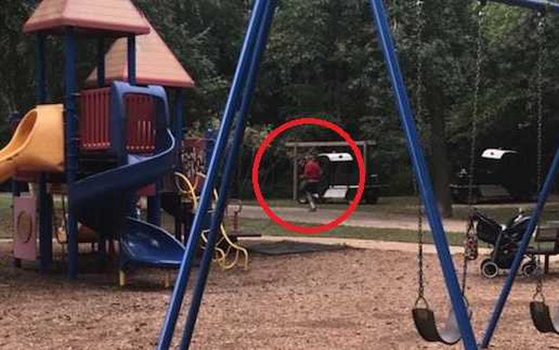 The victim took this photo of the suspect after the incident. The AJC has drawn a red circle around the suspect. This photo was provided by police. Photo: Roswell Police Department