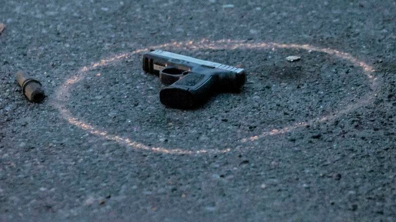 One of several guns found on the street as police investigated a shooting near a West Philadelphia recreation center in August. (Steven M. Falk/The Philadelphia Inquirer/TNS)