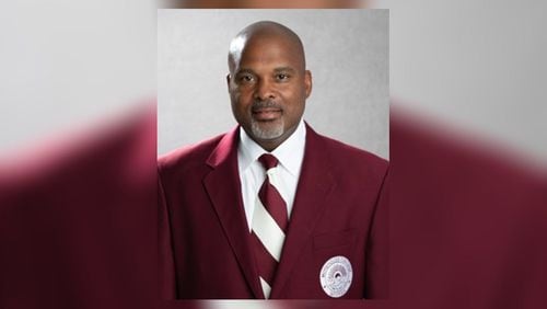 Phillip Thomas, Morehouse's associate athletic director and director of football operations, was booked on charges of aggravated assault and possession of a firearm during the commission of a felony.