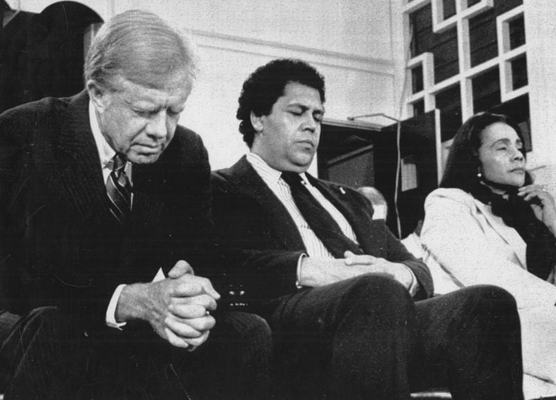 President Jimmy Carter, then-Atlanta Mayor Maynard Jackson and Coretta Scott King join 400 Black Southern Leaders in prayer before Carter addressed the group asking for their support in his re-election bid, Sept. 16, 1980. (Larry Rubenstein / UPI)