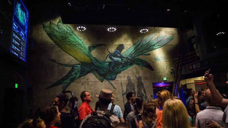 Guests queue for, “Avatar Flight of Passage,” which simulates the effect of riding a banshee, one of “Avatar’s” winged, dragon-like animals, inside Pandora. Jay L. Clendenin/Los Angeles Times/TNS