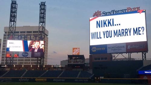 This is the sign at SunTrust Park that Jeff Donahoo used to propose to Nikki Hobus on April 11, 2017. It was the new Braves stadium's first proposal.