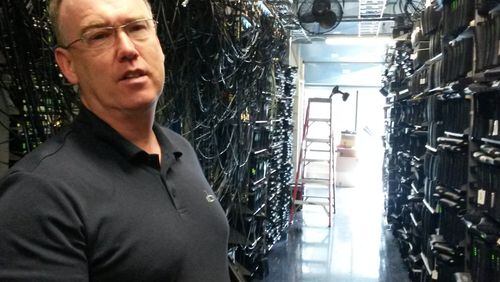 Chief Technology Officer Charles Cheevers at the headquarters of Arris Group, where more than 30,000 cable modems are used for testing. Arris is North America's biggest maker of set-top and gateway cable boxes.