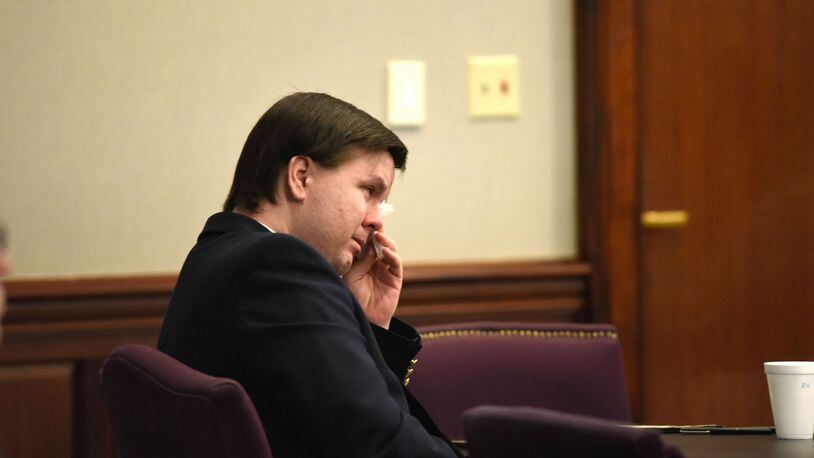 Ross Harris wipes his face with a tissue during closing arguments in his murder trial this week.