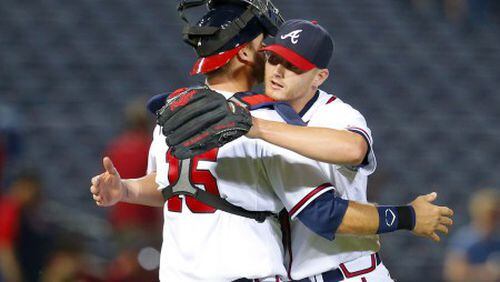 Shelby Miller gets a hug from catcher A.J. Pierzynski after Miller's three-hit shutout against the Phillies last week. (AP photo)