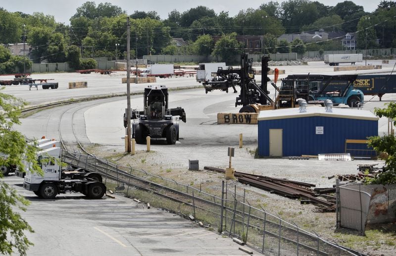 May 6, 2019 - Atlanta - A view of the CSX yard looking west from the Inman Park MARTA station. CSX is shifting international freight operations out of a massive switching station known as Hulsey Yard that bisects the Atlanta Beltline’s eastside trail. The site, which stretches some 40 to 70 acres along DeKalb Avenue east of downtown Atlanta, could be a lucrative redevelopment site. Eliminating the rail yard — the east-west tracks would remain active — also could help advance transit along the Beltline and become one of the premiere development locations in the city. Bob Andres / bandres@ajc.com