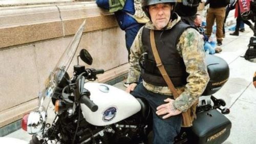 William Frederick Beals II of Ringgold, Ga., sits atop a U.S. Capitol Police motorcycle in a photo included as part of an FBI affidavit. Beals was arrested for participating in the Jan. 6, 2021, U.S. Capitol riot.