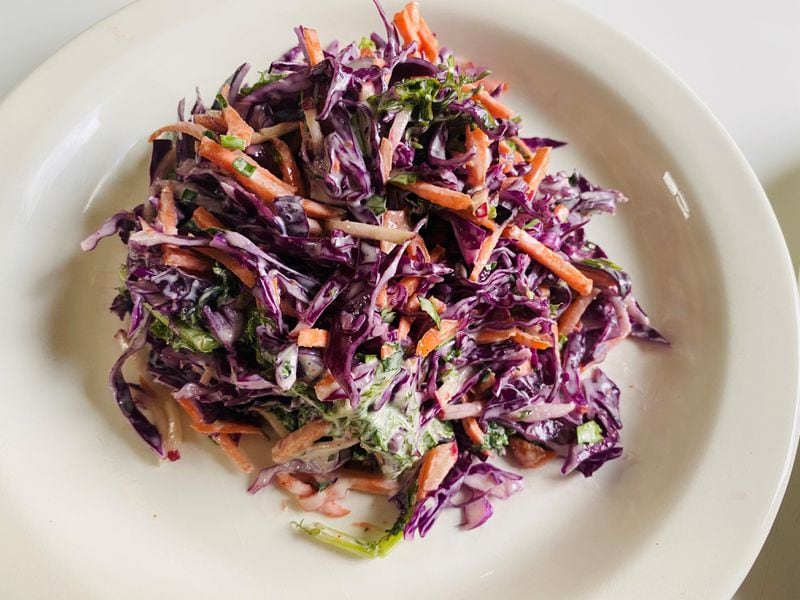 You can get a side of Brussels and cabbage slaw at Chicken Out. Bob Townsend for The Atlanta Journal-Constitution 
