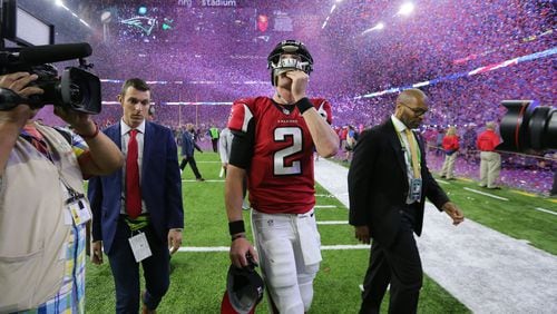 Atlanta Falcons quarterback Matt Ryan leaves the field at the end of the game as the Atlanta Falcons meet the New England Patriots in Super Bowl LI at NRG Stadium in Houston, TX, Sunday, February 5, 2017. The Patriots beat the Falcons in OT 34-28. (Curtis Compton/AJC)